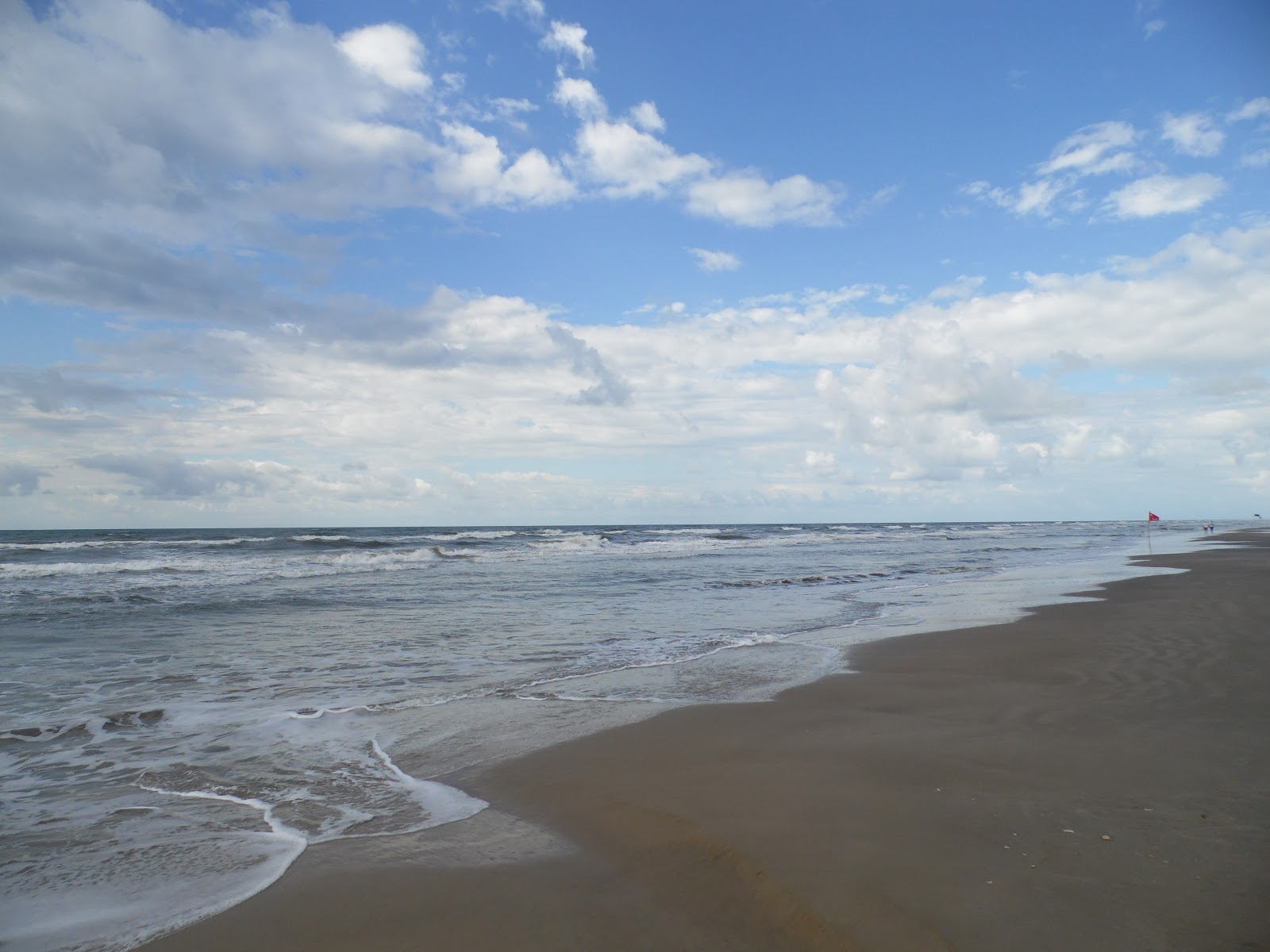 Foto van Praia de Golfino met recht en lang