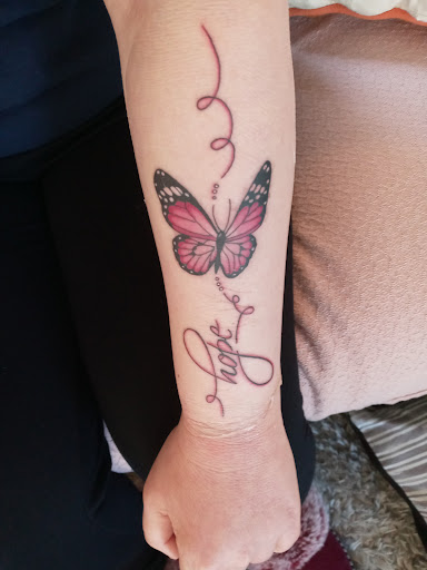 Explore evil eye tattoo ideas, creative tattoo ideas in Jackson, available at Branded By Brittany Ink