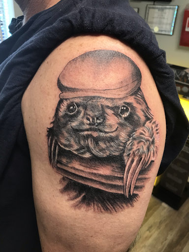 Explore wv tattoo ideas, creative tattoo ideas in Ocala, available at The Tattoo Gallery of Ocala LLC