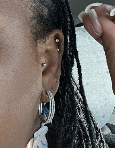 Explore solid black tattoo ideas, creative tattoo ideas in Ocoee, available at Slaughterized Ink Tattoo and Piercing Studio