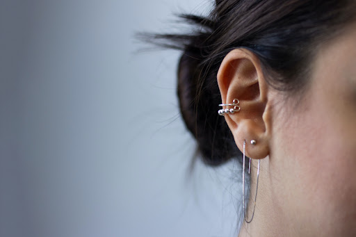 Explore barb wire tattoo ideas, creative tattoo ideas in Irvine, available at BlinKiss Piercing