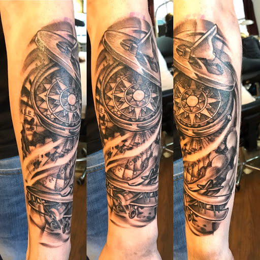 Explore tattoo ideas space liquid tattoo, creative tattoo ideas in Milford, available at Golden Hammer Tattoo Studios