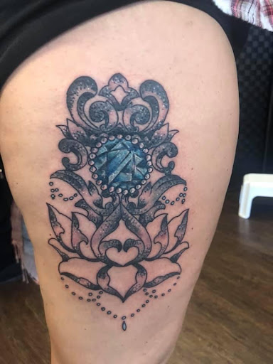 Explore thumb print tattoo ideas, creative tattoo ideas in Osceola, available at Crowned Raven Tattoo Inc.