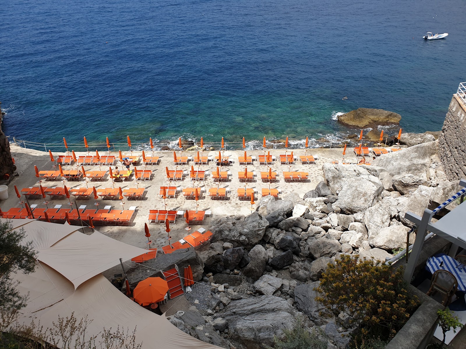 Photo of Lido One Fire Beach backed by cliffs