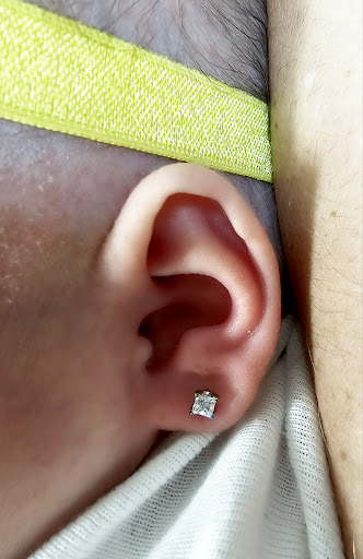 Explore lily tattoo ideas, creative tattoo ideas in Vista, available at Piercing by Maggie - Infant and Child