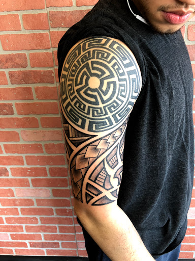 Explore carnation tattoo ideas, creative tattoo ideas in Milford, available at Inkhouse 203