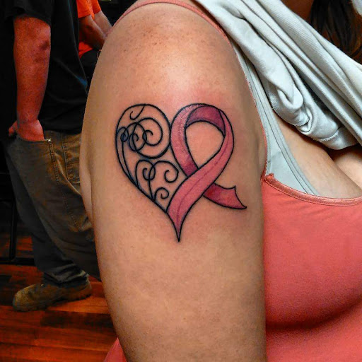 Explore dragon tattoo cover up ideas, creative tattoo ideas in Hudson Falls, available at ALTERED ADDICTION TATTOOS