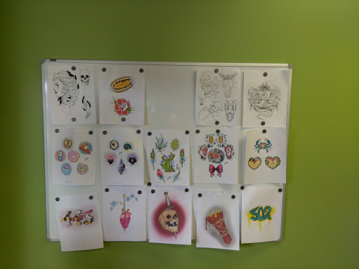 Tattoo Shop «Skull and Rose Tattoo Studio», reviews and photos, 900 E Pulaski Hwy, Elkton, MD 21921, USA