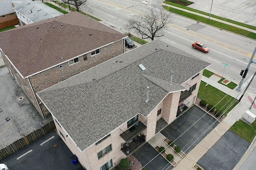 Roofing Contractor «New Edge Improvement Roofing Companies Chicago», reviews and photos, 7151 W Belmont Ave, Chicago, IL 60634, USA