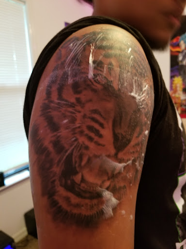 Explore portrait tattoos ideas, creative tattoo ideas in Longwood, available at Trinity Tattoo Co Inc