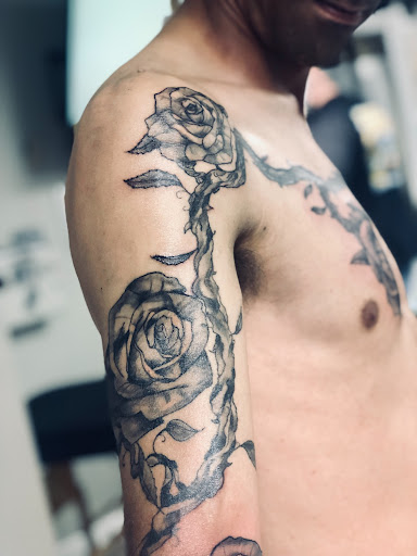 Explore guardian angel tattoo ideas, creative tattoo ideas in Gautier, available at Voodoo Tattoo