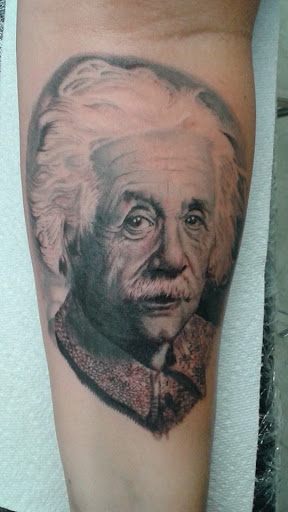 Explore year 2000 tattoo ideas, creative tattoo ideas in Bradenton, available at Sacred Arts Tattoo Bradenton