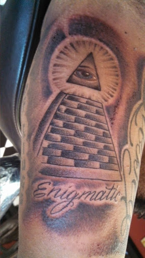 Explore belly button tattoo ideas, creative tattoo ideas in Tucson, available at Sacred Art Tattoo Studio