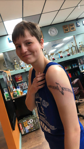 Explore behind ear tattoo ideas, creative tattoo ideas in Duluth, available at Anchors End Tattoo