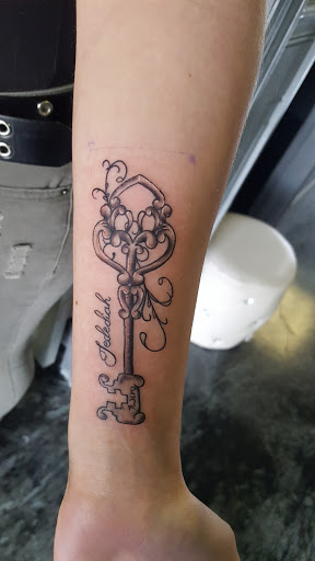 Explore race car tattoo ideas, creative tattoo ideas in Chattanooga, available at Inked Expressions