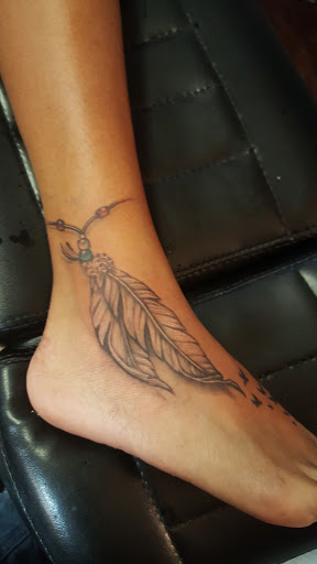 Explore neck tattoo ideas woman, creative tattoo ideas in Nashville, available at ArtWerks Studios