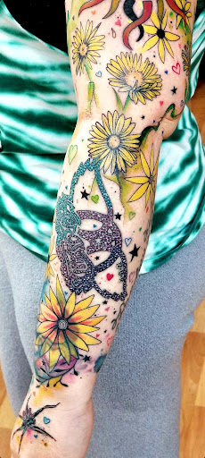 Explore bookworm tattoo ideas, creative tattoo ideas in Benton, available at Spectrum Tattoo