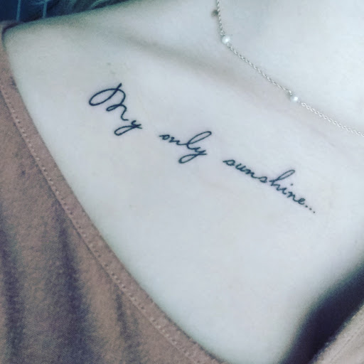 Explore red tattoo ideas, creative tattoo ideas in Kansas City, available at Divine Tattoo Parlor