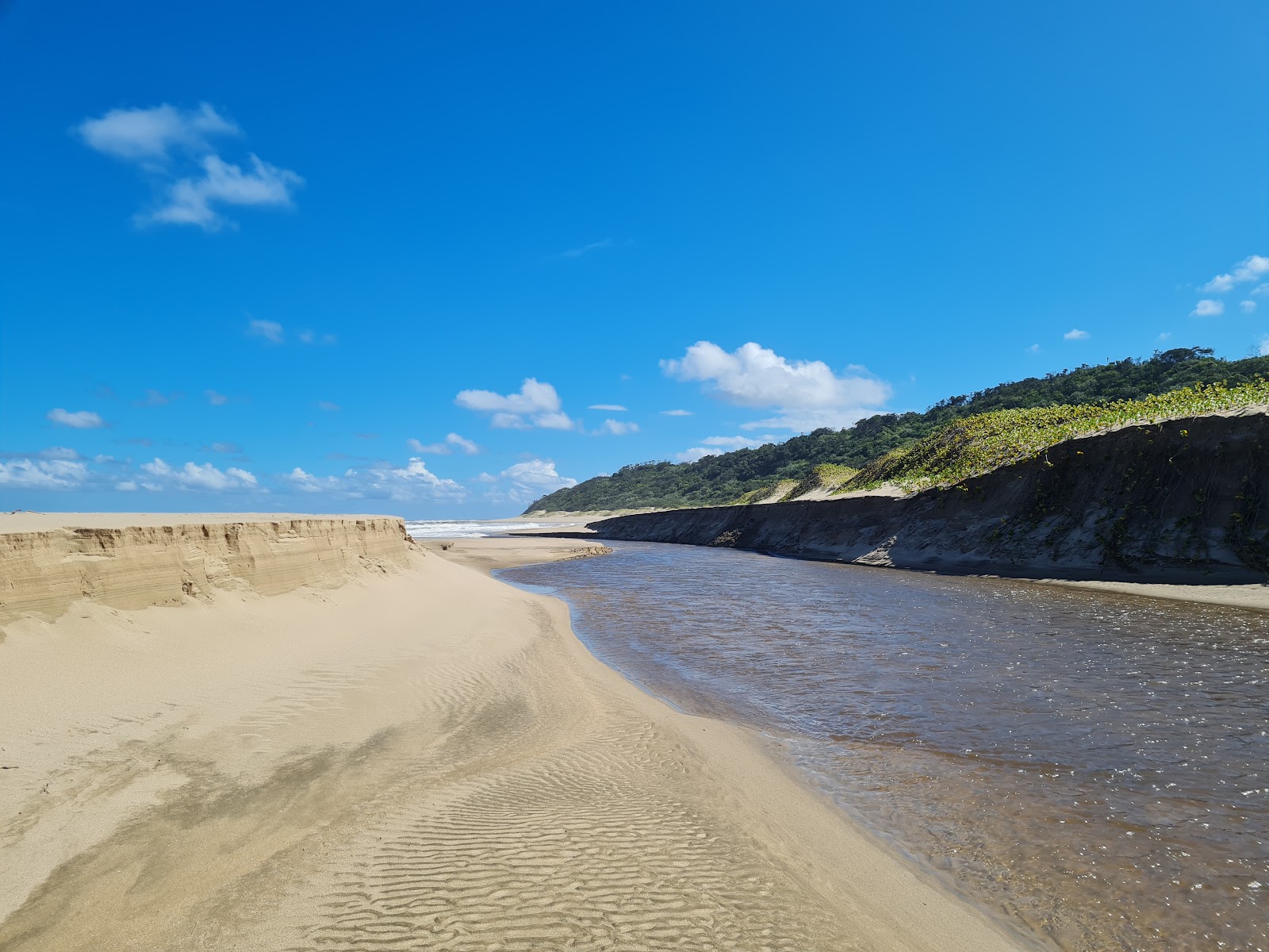Zdjęcie Mzamba beach I z powierzchnią beżowy piasek