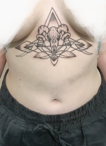 Explore purple tattoo ideas, creative tattoo ideas in Spencer, available at Inkorporated Body Art