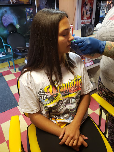 Tattoo Shop «Shotgun Tattoos & Body Piercing», reviews and photos, 307 E Moore Ave, Terrell, TX 75160, USA