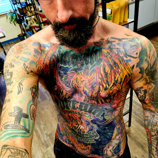 Explore small behind ear tattoo ideas, creative tattoo ideas in Traverse City, available at Pinups & Needles