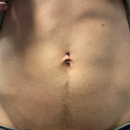 Explore purple flower tattoo ideas, creative tattoo ideas in North Charleston, available at Exotic Impressions Body Piercing