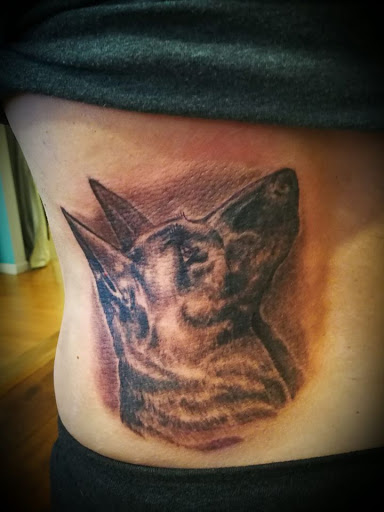 Explore cake tattoo ideas, creative tattoo ideas in Flint, available at Black Eye Social Club Tattoo