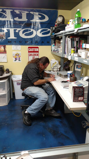 Tattoo Shop «Liquid Tattoo», reviews and photos, 16583 Old U.S. 27, Lansing, MI 48906, USA