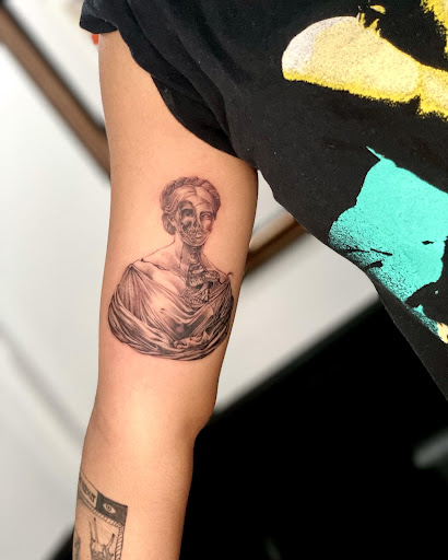 Explore small tattoo ideas with meaning woman, creative tattoo ideas in East Orange, available at Inked Library Tattoo