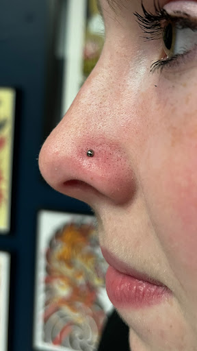 Explore disc golf tattoo ideas, creative tattoo ideas in Arlington, available at Benchmark Tattoos