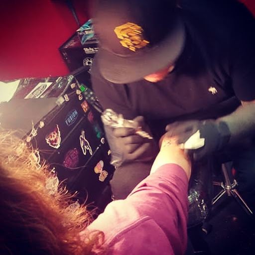 Explore ideas for matching couple tattoos, creative tattoo ideas in Fairborn, available at Royal Prevail Tattoo