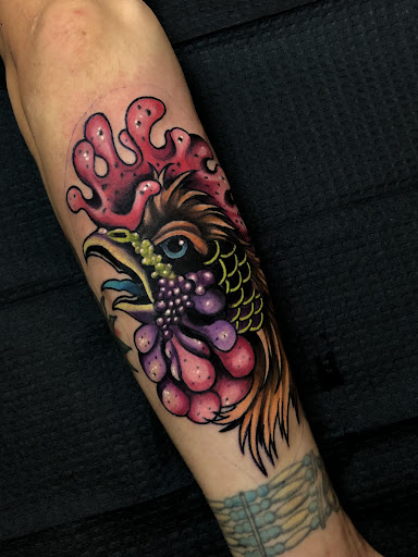 Explore dirt bike tattoos ideas, creative tattoo ideas in Asheboro, available at BlackHeart Tattoo