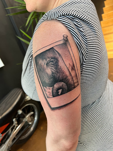 Explore dog sleeve tattoo ideas, creative tattoo ideas in Venice, available at KISS KISS TATTOO & PIERCING