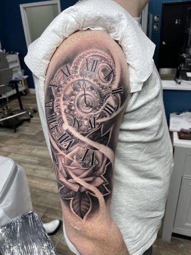 Explore back of leg tattoo ideas, creative tattoo ideas in Buford, available at Wild Tribe Tattoos and Piercings