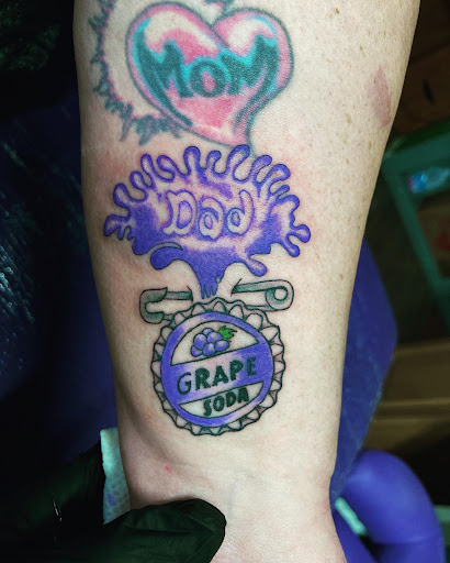 Explore annabelle tattoo ideas, creative tattoo ideas in Cheyenne, available at The T.R.I.B.E. Zoo, LLC Tattoo