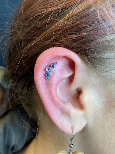 Explore victorian tattoo ideas, creative tattoo ideas in Orange, available at Symbiosis Body Piercing