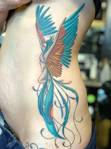 Find tattoo ideas for men music for your next unique tattoo in Lakewood at Aces and Eights Tattoo