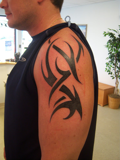 Explore basketball tattoo ideas, creative tattoo ideas in Hebron, available at Explosive Ink Tattoo