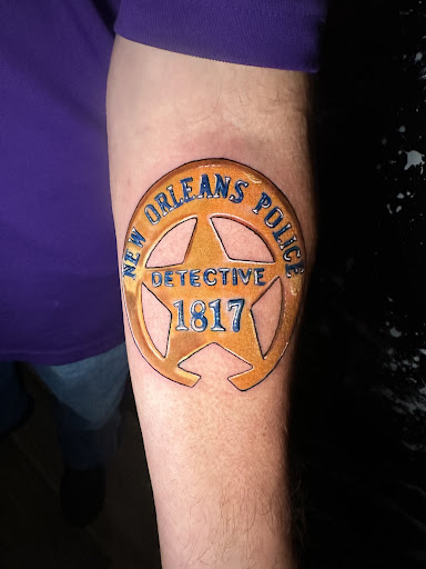 Explore filmmaker tattoo ideas, creative tattoo ideas in Slidell, available at Real Ink Tattoos & Piercings