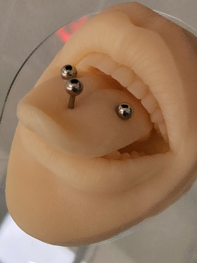 Explore neck tattoo ideas male, creative tattoo ideas in Raleigh, available at The Room Body Piercing Studio