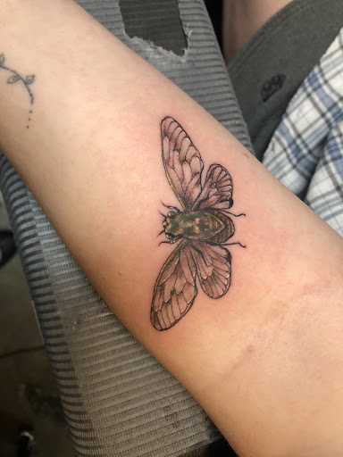 Find small joker tattoo ideas for your next unique tattoo in Frederick at Blue Crab Tattoo & Body Piercing