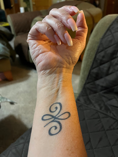 Explore rib tattoo ideas, creative tattoo ideas in Kenosha, available at Kenosha Tattoo Company