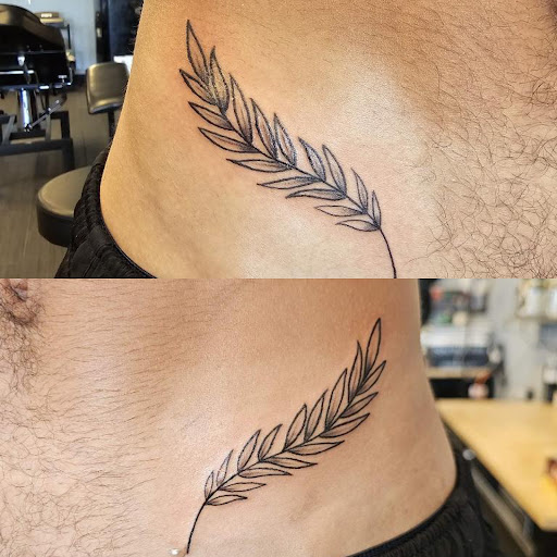 Explore men's back of neck tattoo ideas, creative tattoo ideas in Palm Harbor, available at Angry Owl Tattoo and Piercing