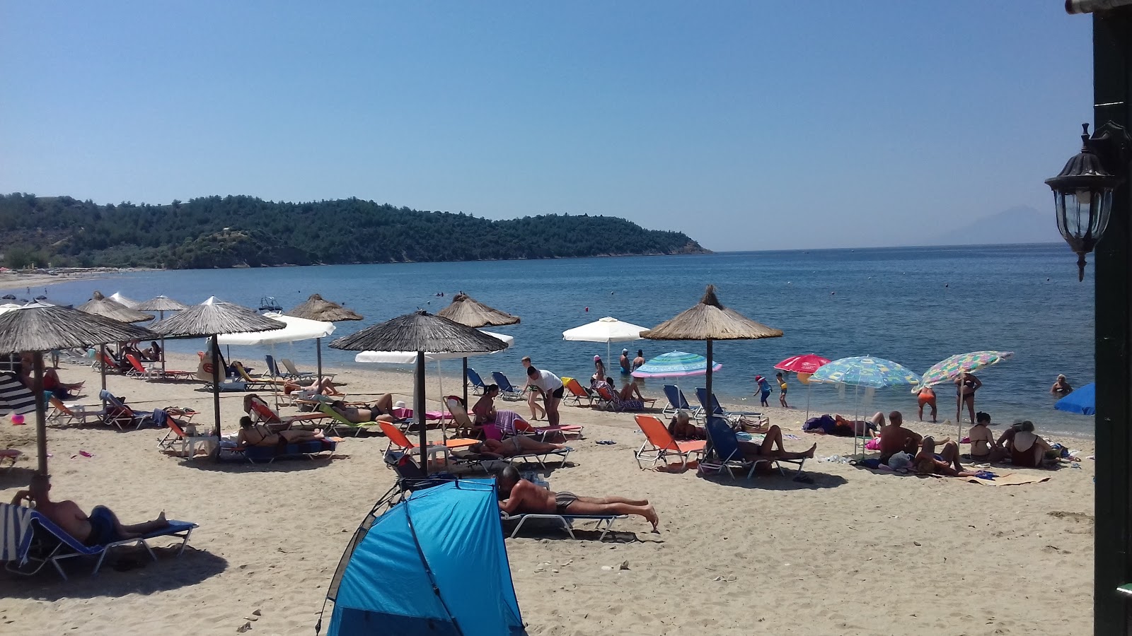 Potos beach'in fotoğrafı parlak kum yüzey ile