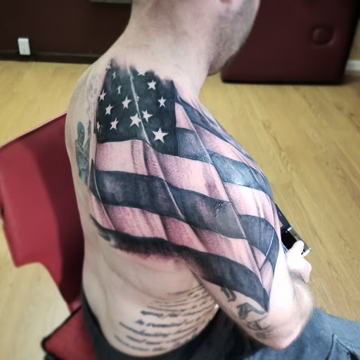 Find inbetween boob tattoo ideas for your next unique tattoo in Lewisburg at Acacia Tattoo Co.