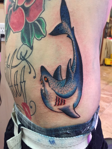 Explore bottom leg tattoo ideas, creative tattoo ideas in Miami Beach, available at Tattoos by Lou Miami - South Beach
