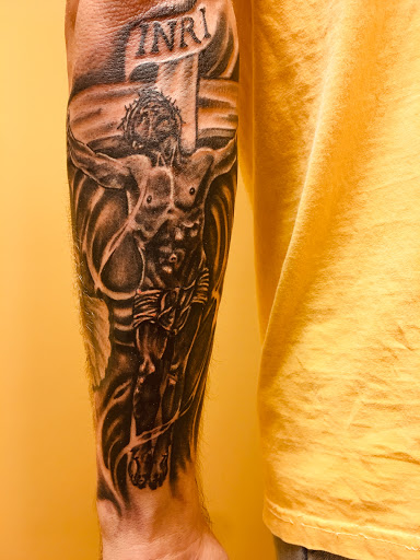 Explore woman sleeve tattoo ideas, creative tattoo ideas in Warner Robins, available at Untold Pain Tattoo Studio