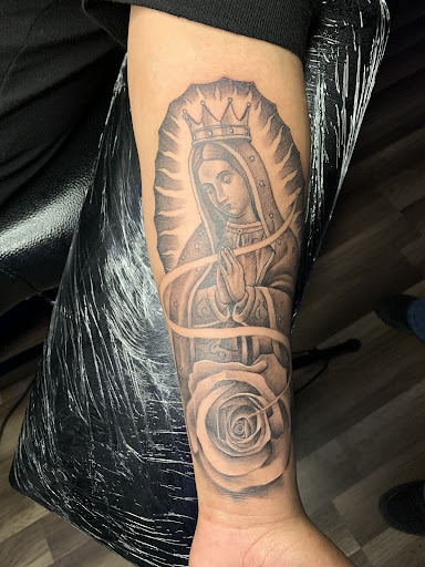 Explore cycle tattoo ideas, creative tattoo ideas in Glendale, available at Urban Legends Tattoo and Piercing LLC