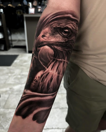 Explore tattoo ideas for breast cancer ribbon, creative tattoo ideas in Bossier City, available at Hand Forged Tattoo - Bossier City